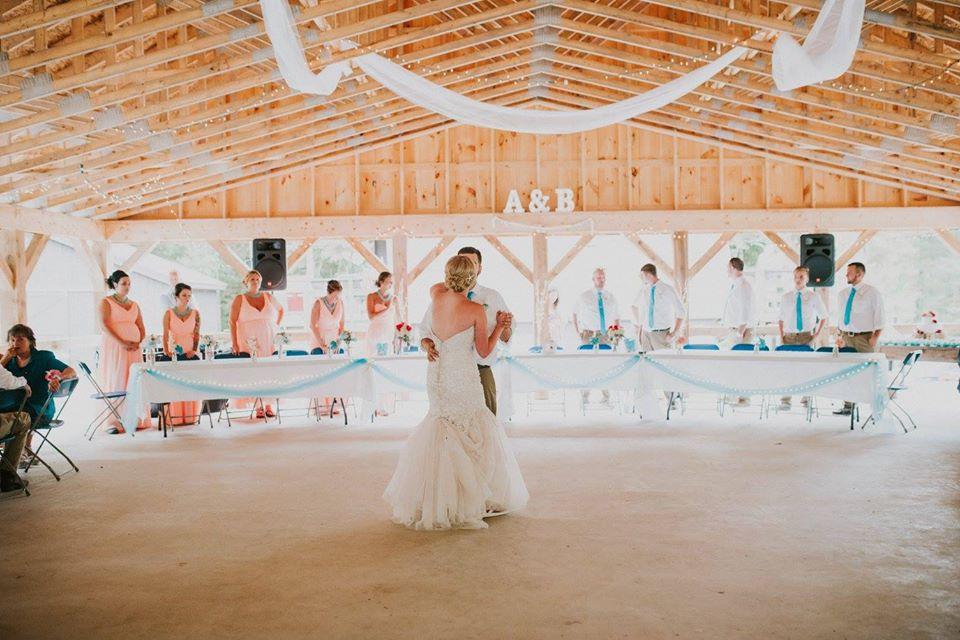 An outdoor wedding ceremony in the woods